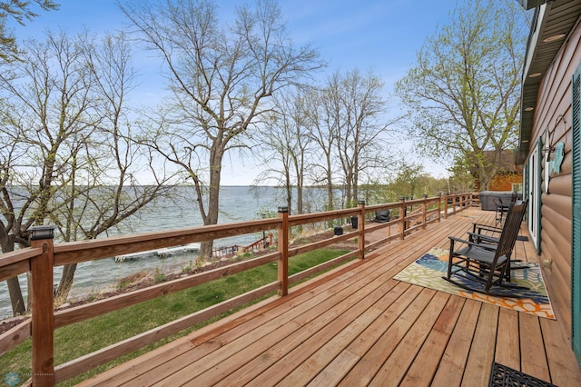 24295 Matson Point Trl, Lida Twp, MN 56572 - wooden terrace featuring a water view and a yard