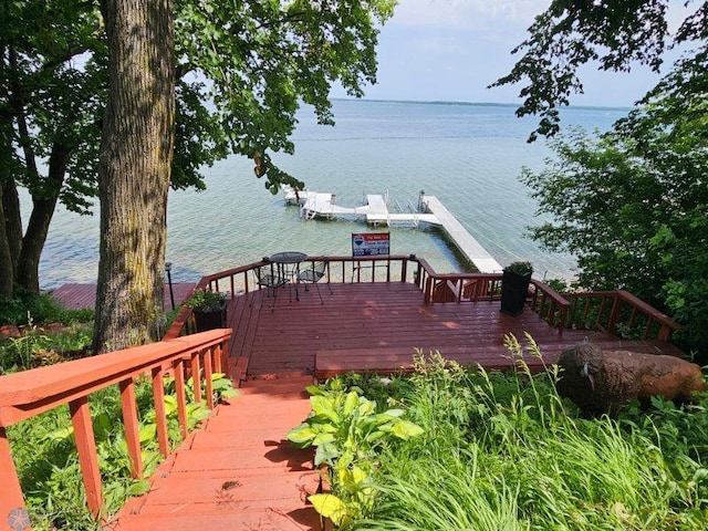 24295 Matson Point Trl, Lida Twp, MN 56572 - wooden terrace with a water view and a dock