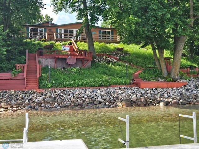 24295 Matson Point Trl, Lida Twp, MN 56572 - dock featuring a wooden deck and stairway
