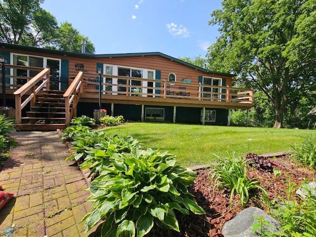 24295 Matson Point Trl, Lida Twp, MN 56572 - rear view of property with a lawn and a deck