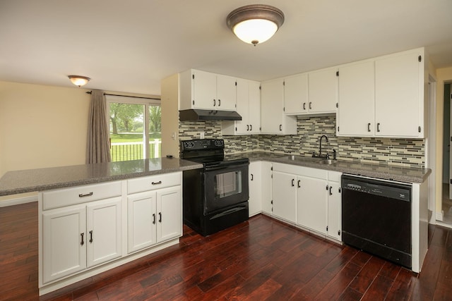 kitchen with black appliances, under cabinet range hood, a sink, white cabinetry, and tasteful backsplash