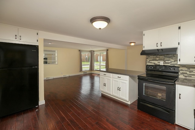 kitchen with black appliances, under cabinet range hood, decorative backsplash, and white cabinets