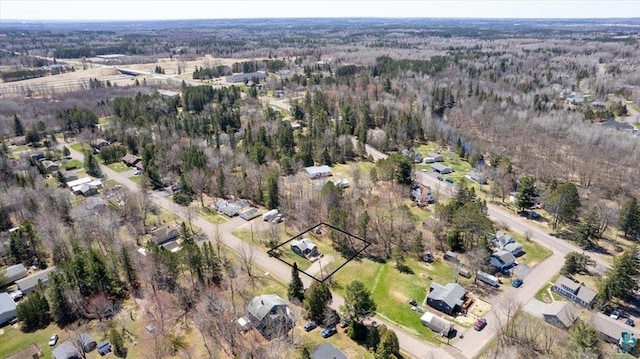 view of property location featuring property boundaries highlighted and a heavily wooded area
