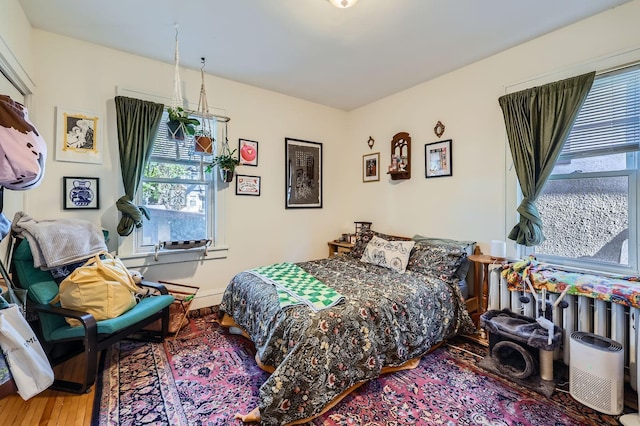 bedroom with wood finished floors