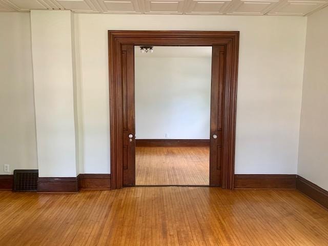 504 Buchanan St, Red Wing, MN 55066 - spare room with hardwood / wood-style flooring and baseboards