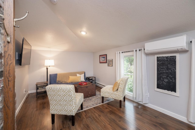 504 Buchanan St, Red Wing, MN 55066 - living area featuring a wall mounted air conditioner, wood finished floors, lofted ceiling, baseboards, and baseboard heating