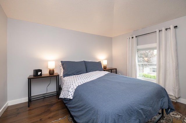 504 Buchanan St, Red Wing, MN 55066 - bedroom with wood finished floors, baseboards, and vaulted ceiling