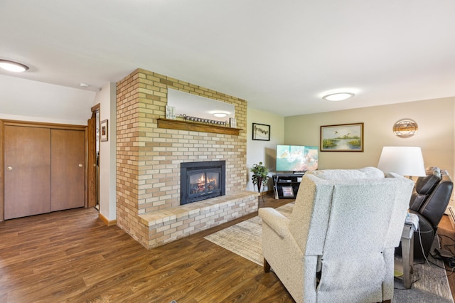50 Lakeview Dr NW, Cokato, MN 55321 - living room featuring a brick fireplace and wood finished floors