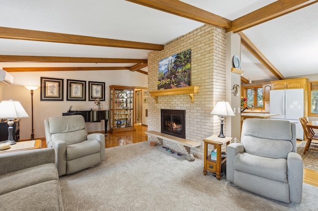 50 Lakeview Dr NW, Cokato, MN 55321 - living room featuring a brick fireplace, a wall unit AC, and wood finished floors