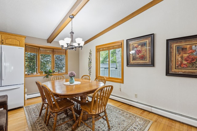 50 Lakeview Dr NW, Cokato, MN 55321 - dining room with a baseboard heating unit, a chandelier, and light wood finished floors