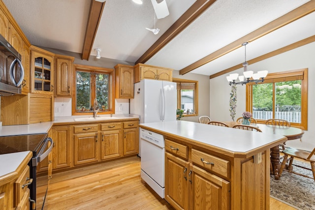 50 Lakeview Dr NW, Cokato, MN 55321 - kitchen with white appliances, a sink, and plenty of natural light