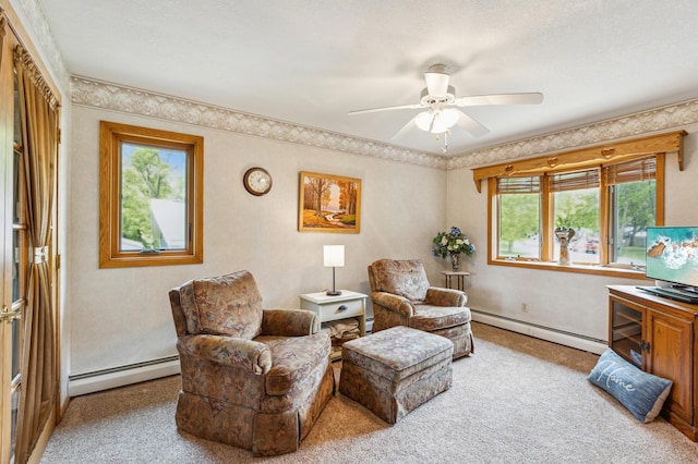 50 Lakeview Dr NW, Cokato, MN 55321 - sitting room featuring a baseboard heating unit, carpet flooring, and a ceiling fan
