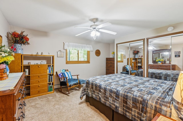 50 Lakeview Dr NW, Cokato, MN 55321 - bedroom featuring carpet, multiple closets, and ceiling fan