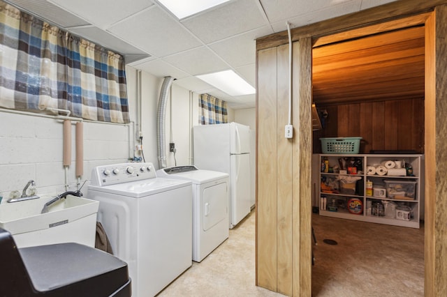 50 Lakeview Dr NW, Cokato, MN 55321 - washroom with separate washer and dryer and wood walls