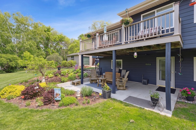 50 Lakeview Dr NW, Cokato, MN 55321 - view of grassy yard with a patio area and a wooden deck