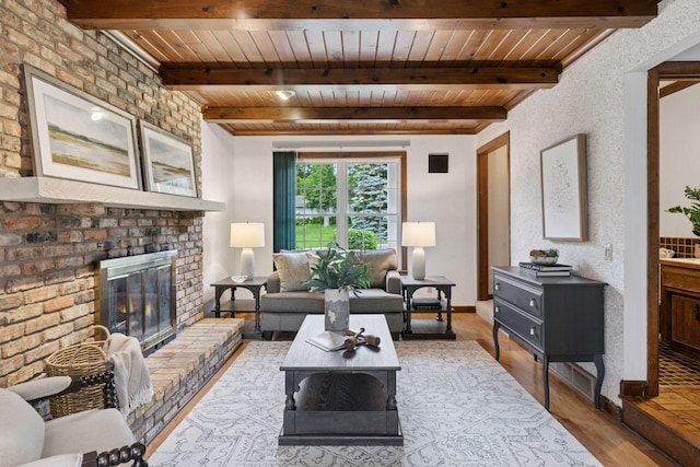5235 139th St, Savage, MN 55378 - living room with a wooden ceiling with exposed beams, wood finished floors, and a fireplace