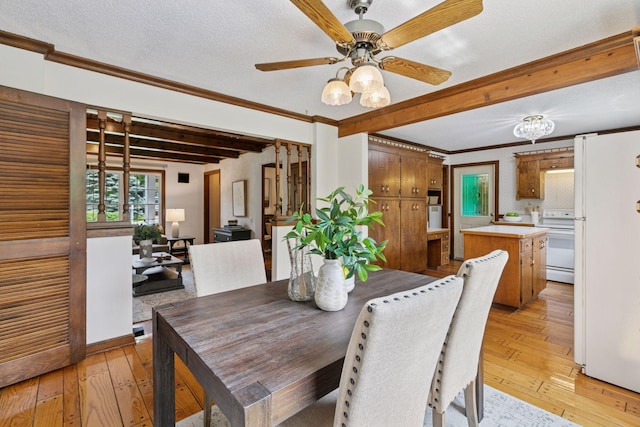 5235 139th St, Savage, MN 55378 - dining area with beamed ceiling, light wood-style floors, ornamental molding, and ceiling fan