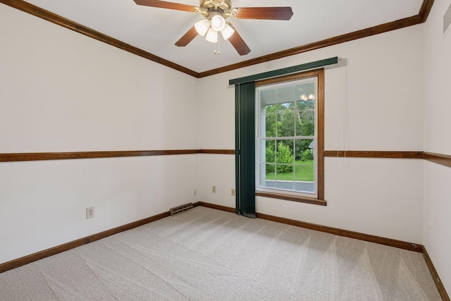 5235 139th St, Savage, MN 55378 - spare room with ornamental molding, light colored carpet, and a ceiling fan