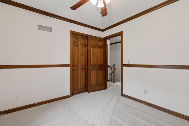 5235 139th St, Savage, MN 55378 - empty room with light carpet, a ceiling fan, and ornamental molding