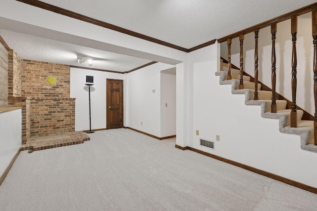 5235 139th St, Savage, MN 55378 - unfurnished living room featuring a textured ceiling, carpet, stairway, and crown molding