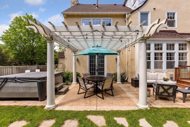 4201 Dupont Ave S, Minneapolis, MN 55409 - view of patio with a hot tub, a pergola, and outdoor lounge area
