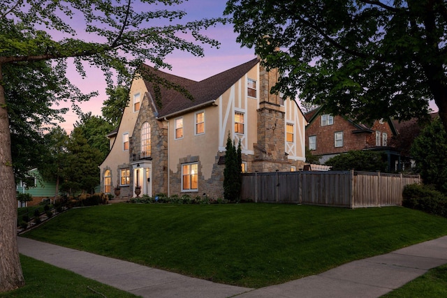 4201 Dupont Ave S, Minneapolis, MN 55409 - tudor-style house with stone siding and stucco siding