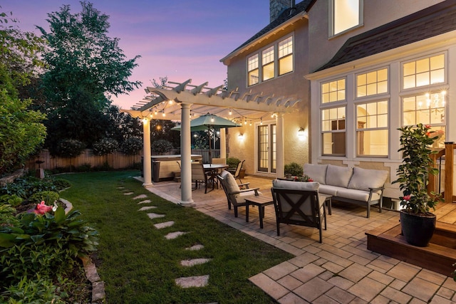 4201 Dupont Ave S, Minneapolis, MN 55409 - patio terrace at dusk with a pergola, an outdoor hangout area, a patio, and french doors