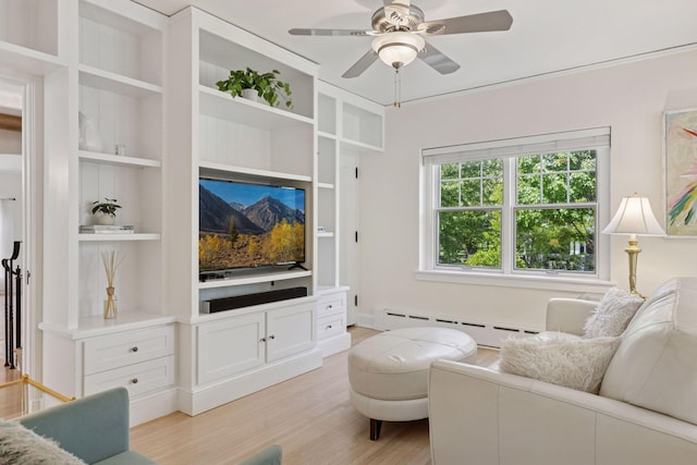 4201 Dupont Ave S, Minneapolis, MN 55409 - living area with a baseboard radiator, light wood-type flooring, built in features, and ceiling fan