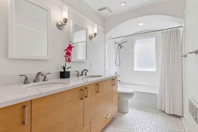 4201 Dupont Ave S, Minneapolis, MN 55409 - bathroom with double vanity, shower / tub combo, toilet, tile patterned floors, and recessed lighting
