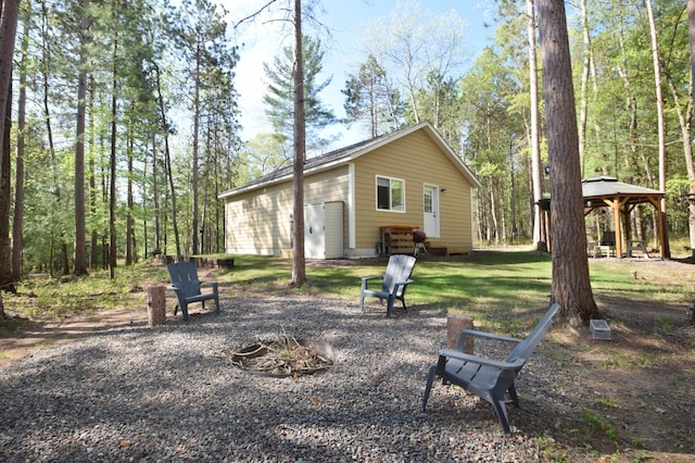 28607 Great Bear Path Way, Danbury, WI 54830 - back of house featuring a gazebo and an outdoor fire pit