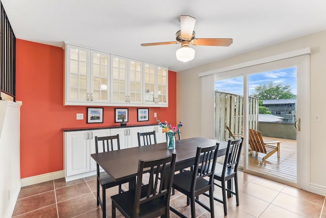 166 Windsor Ln, New Brighton, MN 55112 - tiled dining area featuring baseboards and a ceiling fan