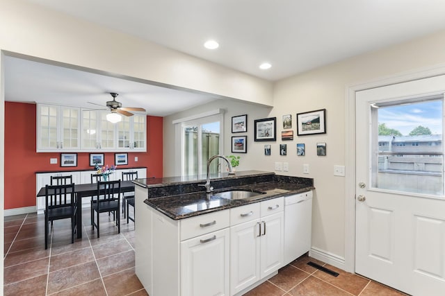 166 Windsor Ln, New Brighton, MN 55112 - kitchen with a peninsula, a sink, dishwasher, tile patterned floors, and white cabinets