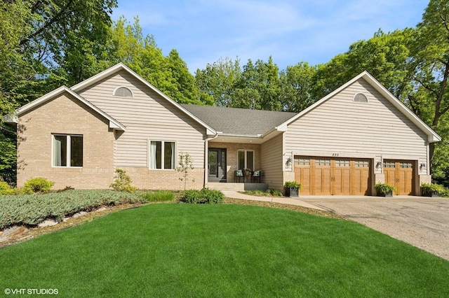 820 Vineland Ct, Chanhassen, MN 55317 - single story home featuring brick siding, a front yard, a garage, and driveway