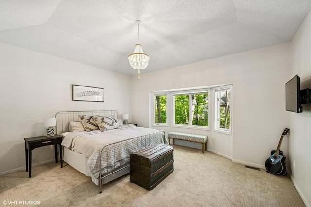 820 Vineland Ct, Chanhassen, MN 55317 - bedroom featuring light carpet, a chandelier, and baseboards