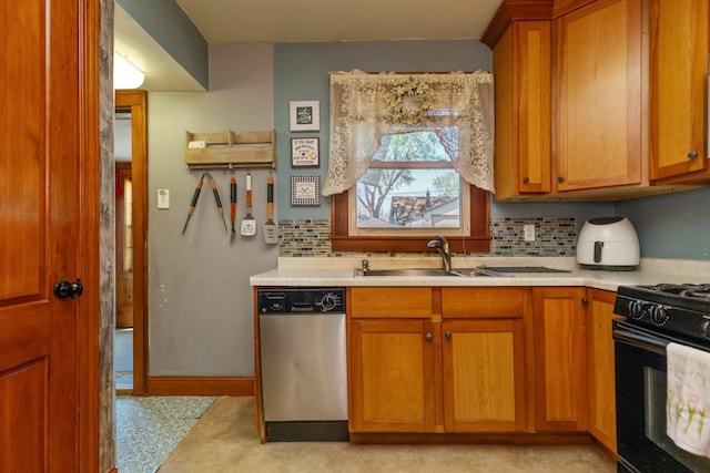 kitchen featuring stainless steel dishwasher, a sink, black gas stove, light countertops, and tasteful backsplash