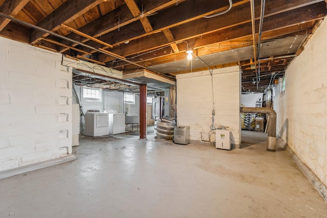 basement featuring washer and clothes dryer