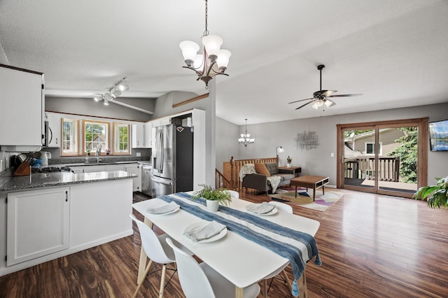 10751 Kumquat St NW, Coon Rapids, MN 55448 - dining room featuring a chandelier, dark wood-style floors, lofted ceiling, and a ceiling fan