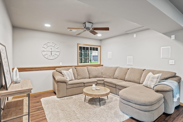 10751 Kumquat St NW, Coon Rapids, MN 55448 - living area with wood finished floors, ceiling fan, recessed lighting, and baseboards