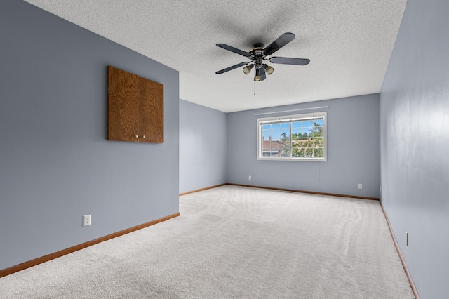 7954 Timber Lake Dr, Eden Prairie, MN 55347 - empty room featuring a textured ceiling, carpet, and a ceiling fan