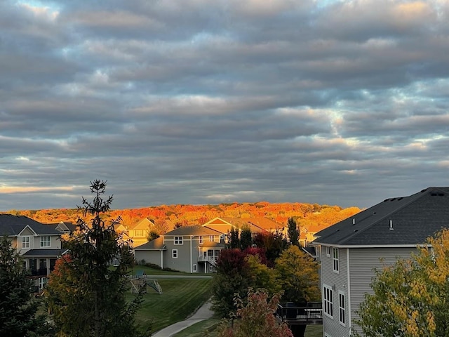 view of mountain backdrop with nearby suburban area