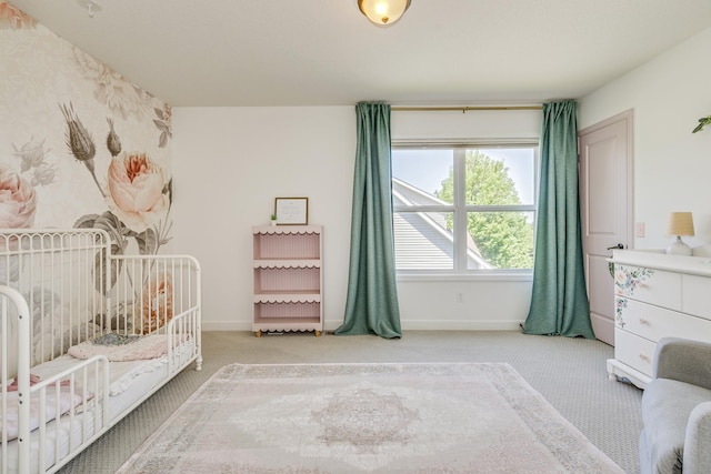carpeted bedroom with baseboards