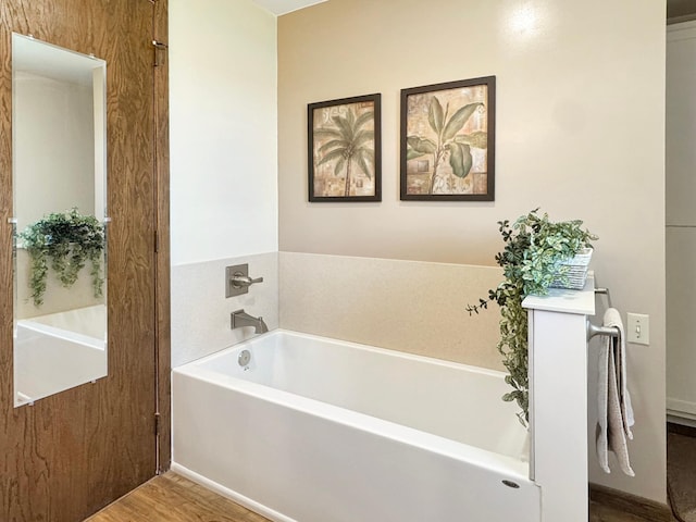 2216 County Road 15, Russell, MN 56169 - bathroom with wood finished floors and a garden tub