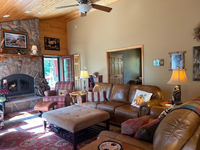 10115 Island Lake Rd, Solon Springs, WI 54873 - living area with high vaulted ceiling, wooden ceiling, ceiling fan, a stone fireplace, and wood walls