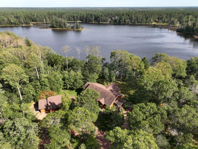 10115 Island Lake Rd, Solon Springs, WI 54873 - aerial view of a heavily wooded area and a large body of water