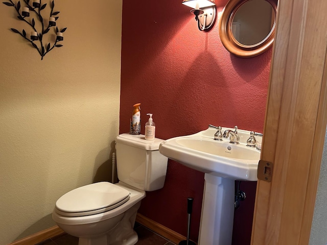 10115 Island Lake Rd, Solon Springs, WI 54873 - bathroom with toilet and tile patterned floors