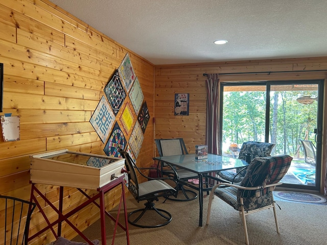 10115 Island Lake Rd, Solon Springs, WI 54873 - dining space with a textured ceiling, wooden walls, and recessed lighting
