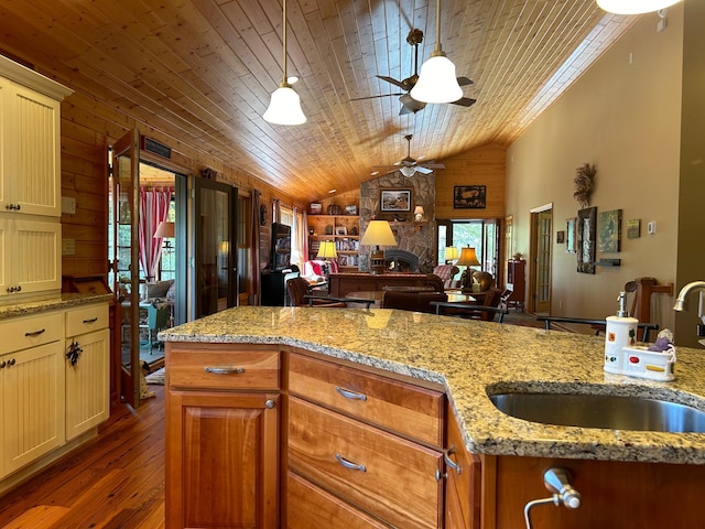 10115 Island Lake Rd, Solon Springs, WI 54873 - kitchen featuring wooden ceiling, lofted ceiling, ceiling fan, dark wood-type flooring, and a sink