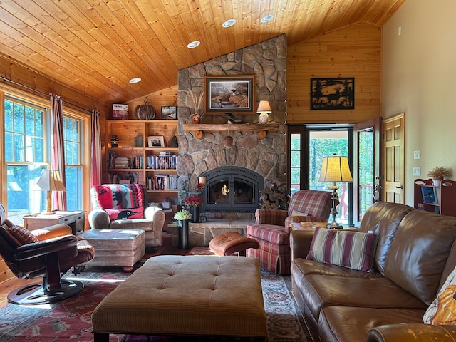 10115 Island Lake Rd, Solon Springs, WI 54873 - living room with wooden walls, wooden ceiling, high vaulted ceiling, and a fireplace