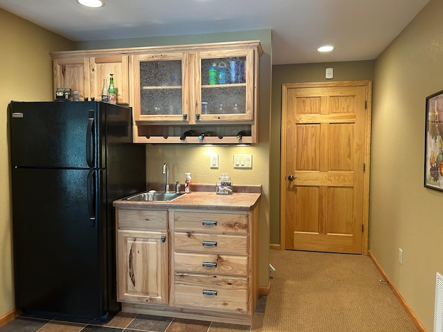 10115 Island Lake Rd, Solon Springs, WI 54873 - kitchen with freestanding refrigerator, a sink, glass insert cabinets, baseboards, and recessed lighting