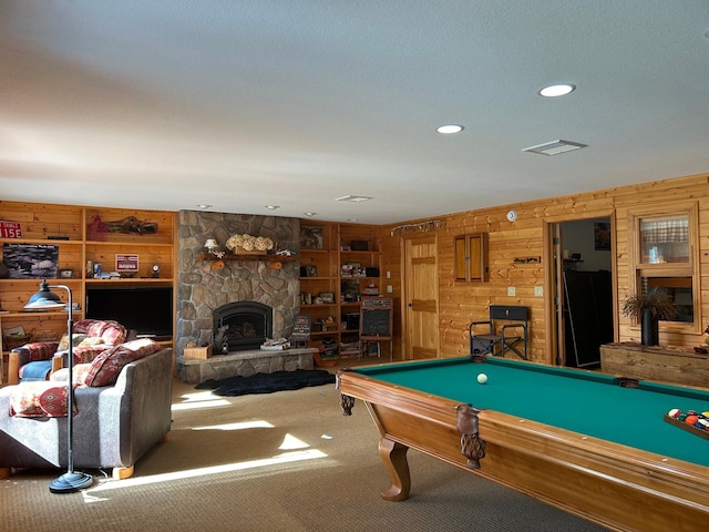 10115 Island Lake Rd, Solon Springs, WI 54873 - playroom featuring wood walls, carpet flooring, a stone fireplace, billiards, and recessed lighting